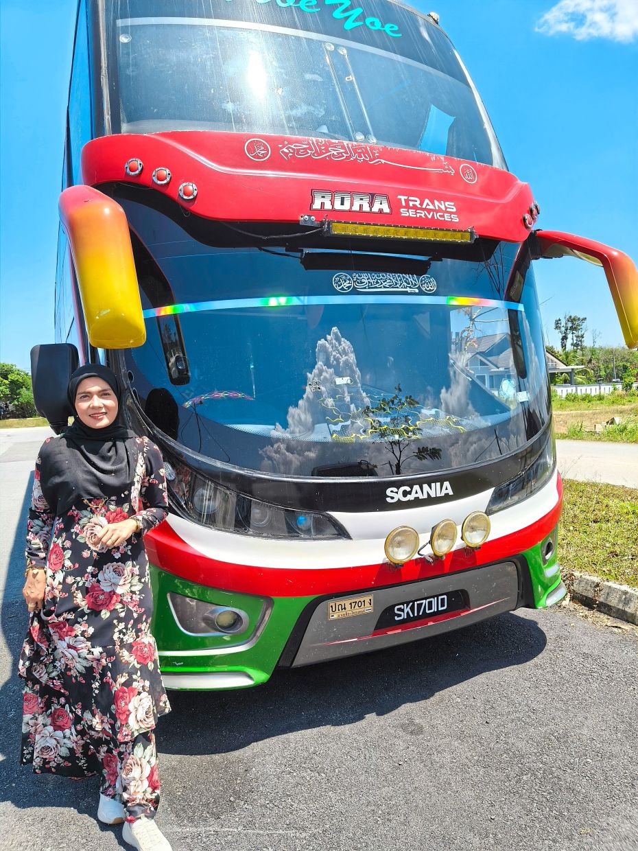 Siti Azmira brings elegance to a job rarely associated with traditional attire.