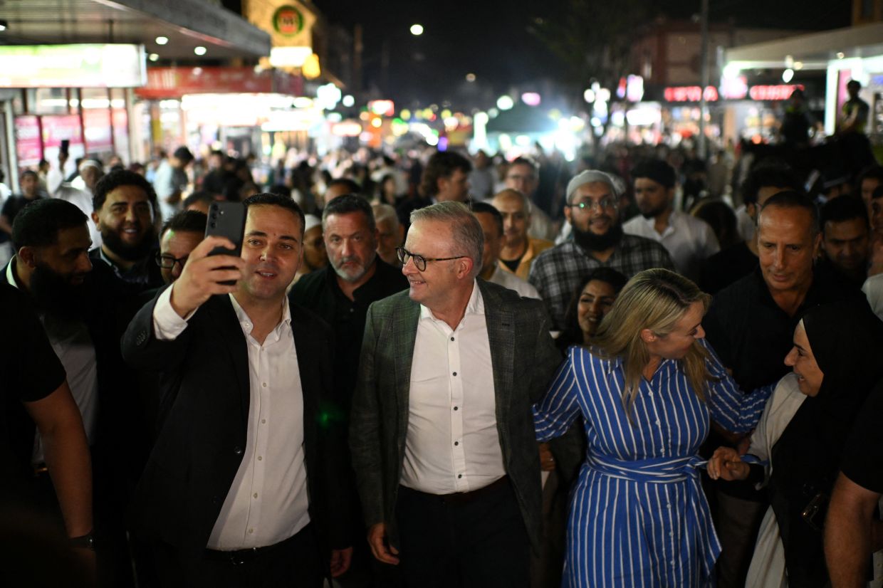 Australia’s Prime Minister Anthony Albanese and his wife Jodie Haydon visiting Lakemba during the Muslim holy month of Ramadan in Sydney on, March 6, 2026. - Reuters