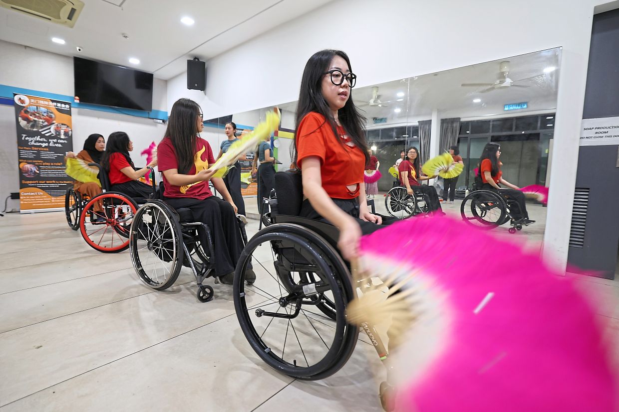 Yee practising for a performance.