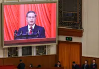 China’s new five-year plan targets tax reform as local governments face fiscal strain