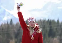 Paralympics-Russian flag returns to Games podium with two downhill bronzes