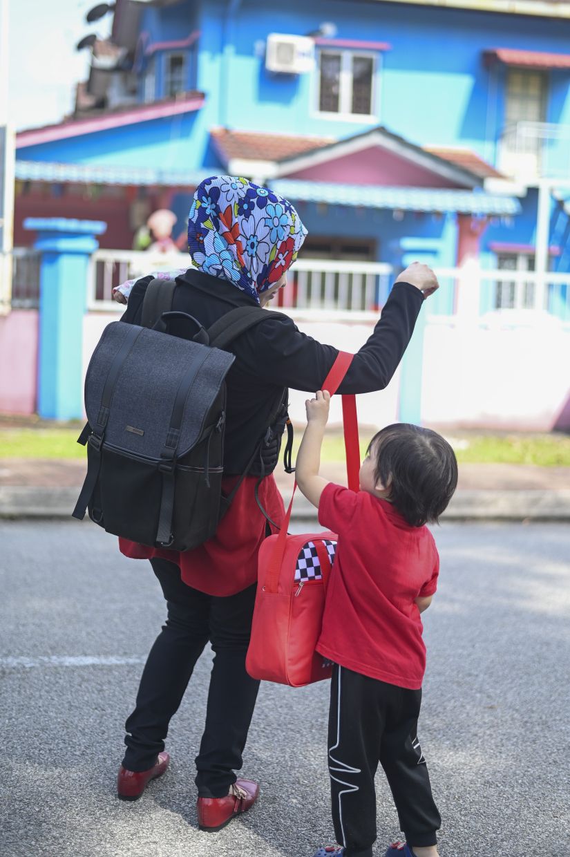 Single mothers, especially, say that it is financial preparedness that helps to ensure stability for themselves and their children. — IZZRAFIQ ALIAS/The Star