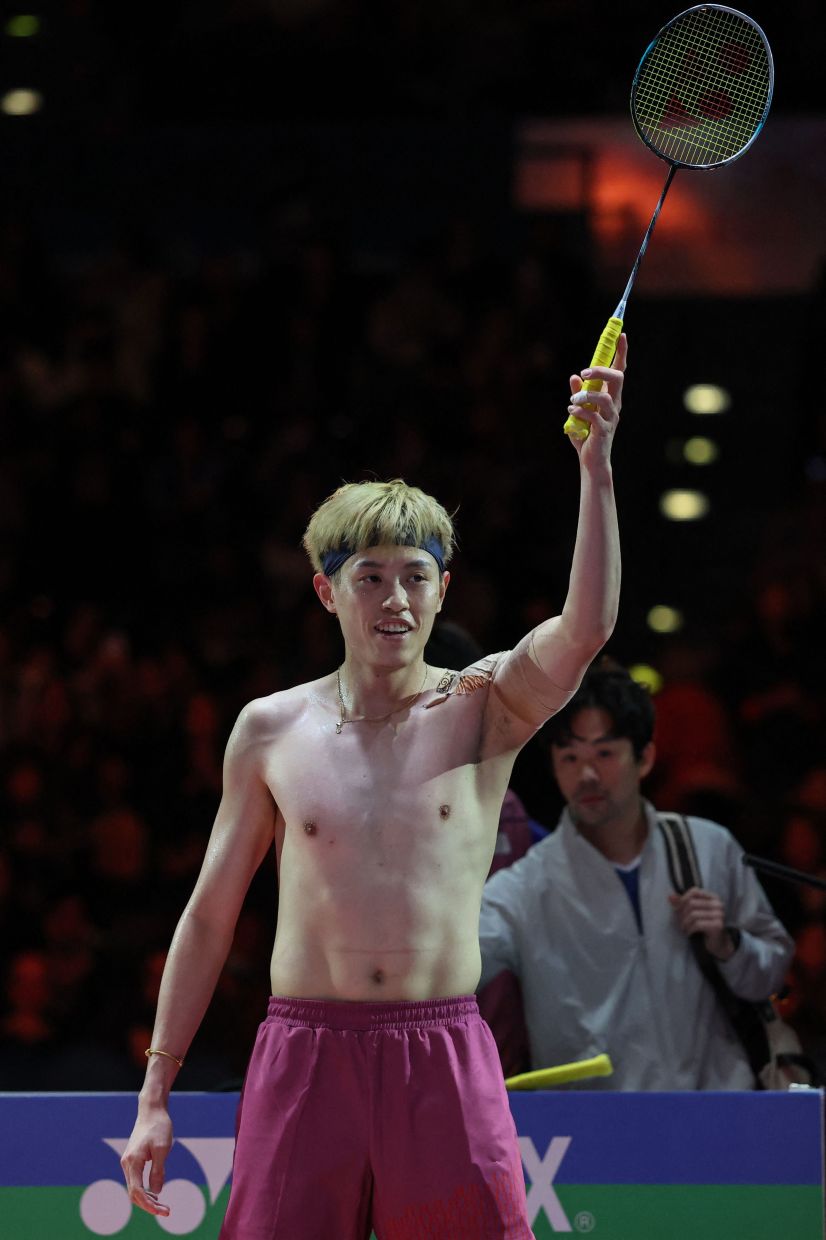 Taiwan's Lin Chun-yi celebrates his victory over India's Lakshya Sen in their men's singles final at the All England Open Badminton Championships at the Utilita Arena in Birmingham, central England, on March 8, 2026. (Photo by Darren Staples / AFP)