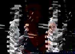 Badminton-Lin upsets Vitidsarn to set up All England Open final against India's Sen