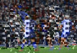 Rugby-Italy earn first-ever win over England