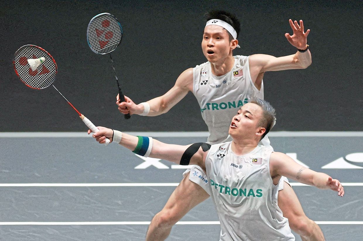 Dynamic duo: Aaron Chia-Soh Wooi Yik in action against China’s Chen Boyang-Liu Yi during their men’s doubles semi-final match. — Reuters