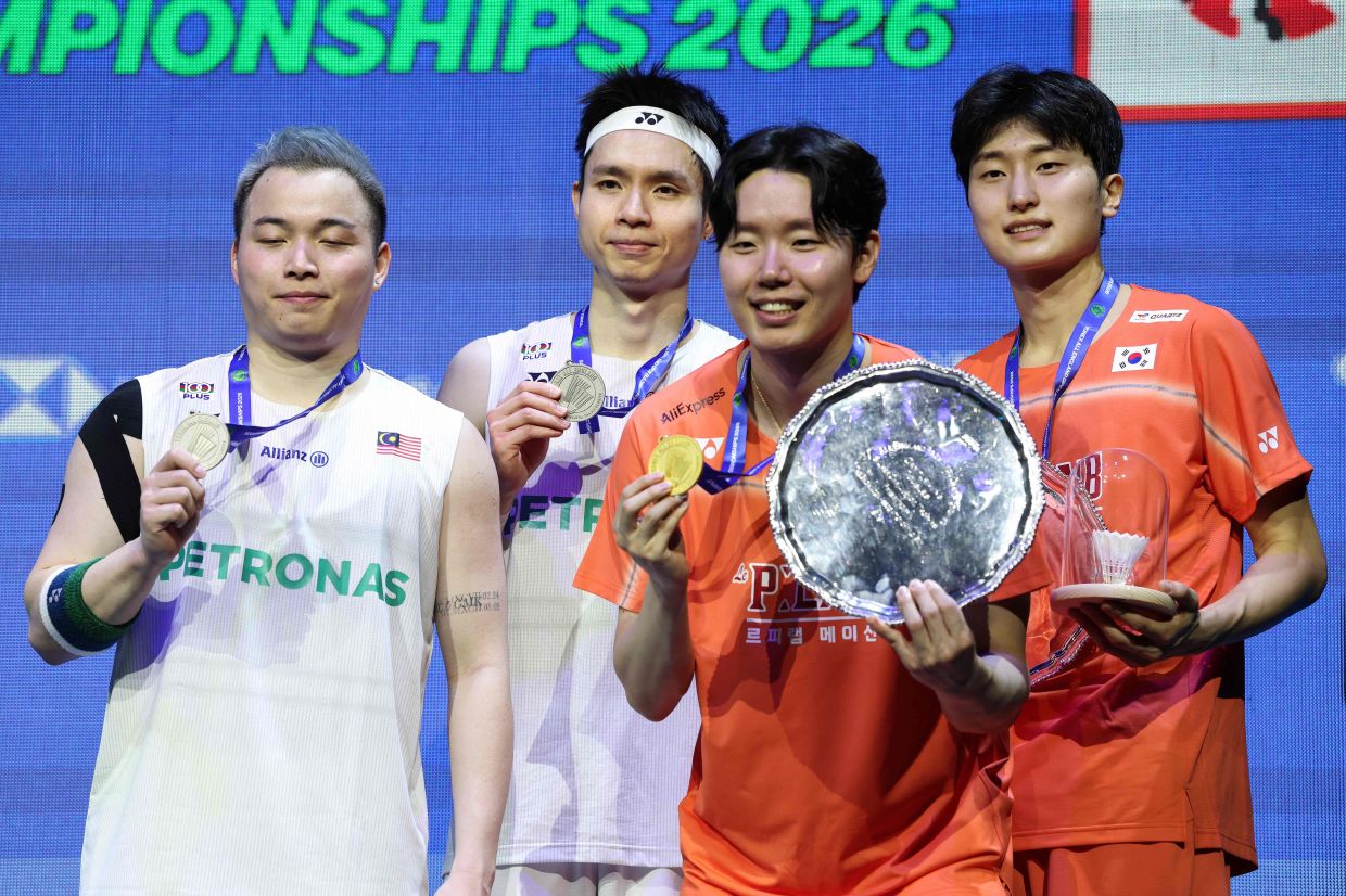 From left: Aaron Chia, Soh Wooi Yik, Seo Seung-jae and Kim Won-ho. - AFP
