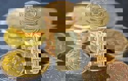 Gold prices fall as dollar firms, US rate-cut optimism fades