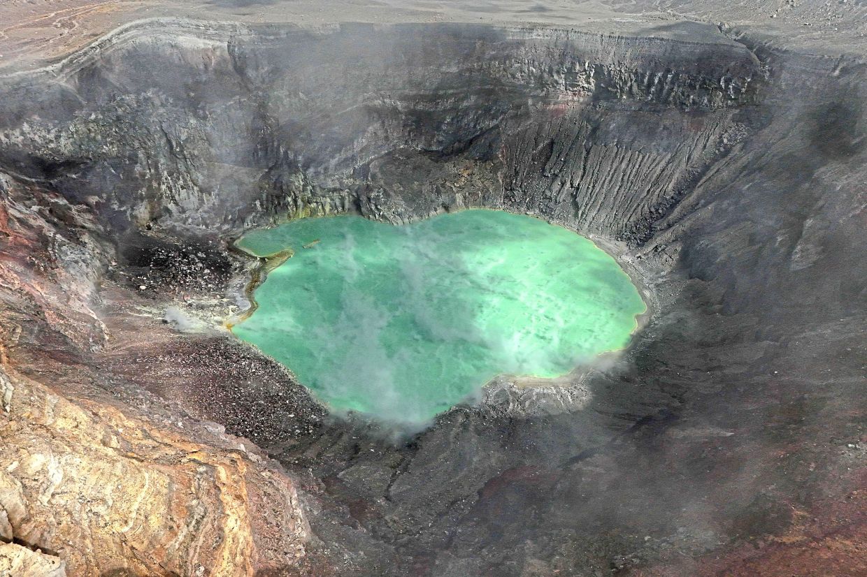 This aerial view shows the crater of the Ilamatepec Volcano in Santa Ana, El Salvador. 