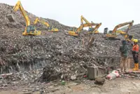 Search ends after landfill slide