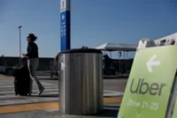 Zoox and Uber tie up to deploy robotaxis on ride-hailing network