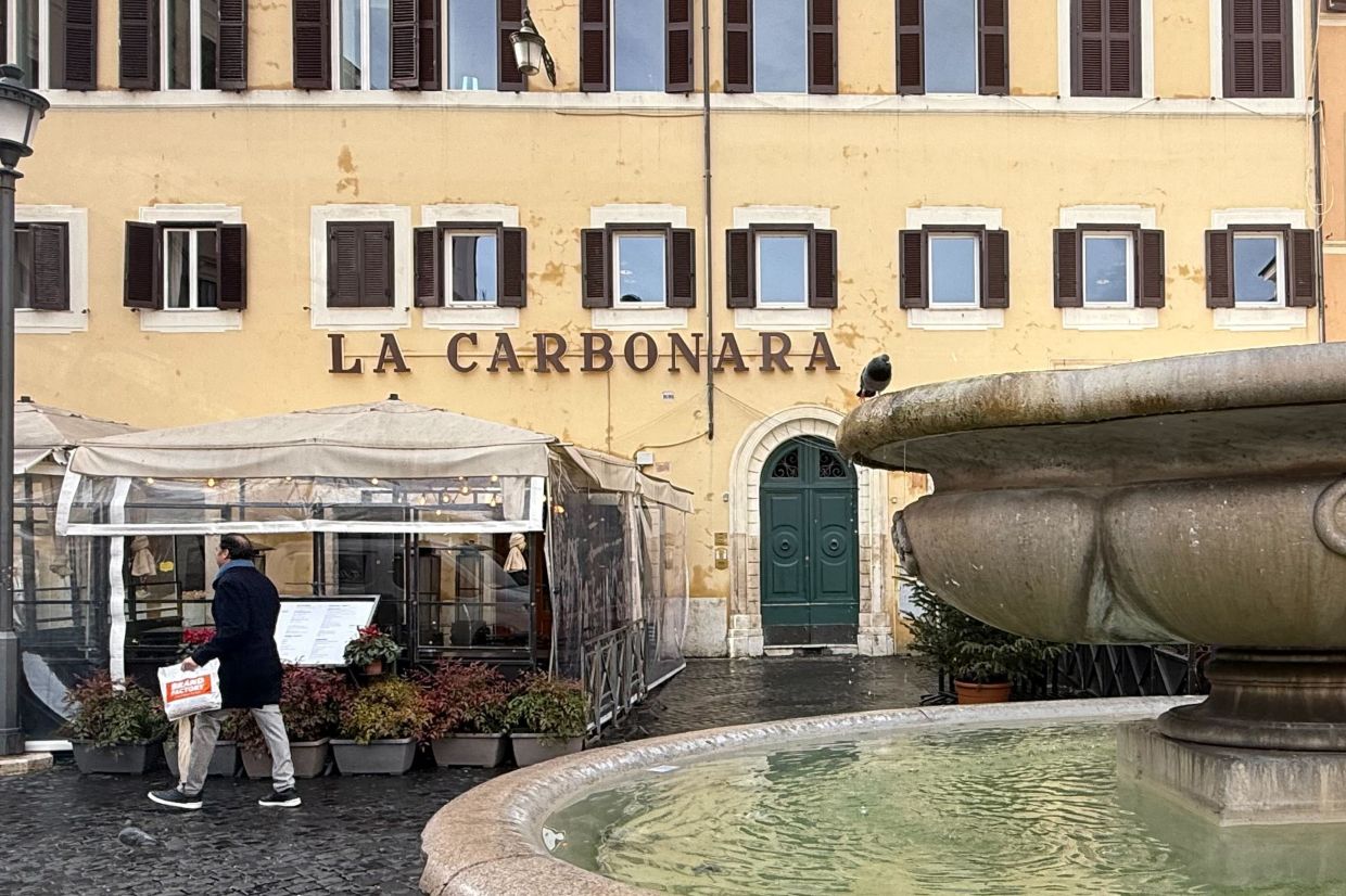The La Carbonara restaurant in Rome is more than 100 years old, but it did not create the pasta with its namesake. Photo: Christoph Sator/dpa