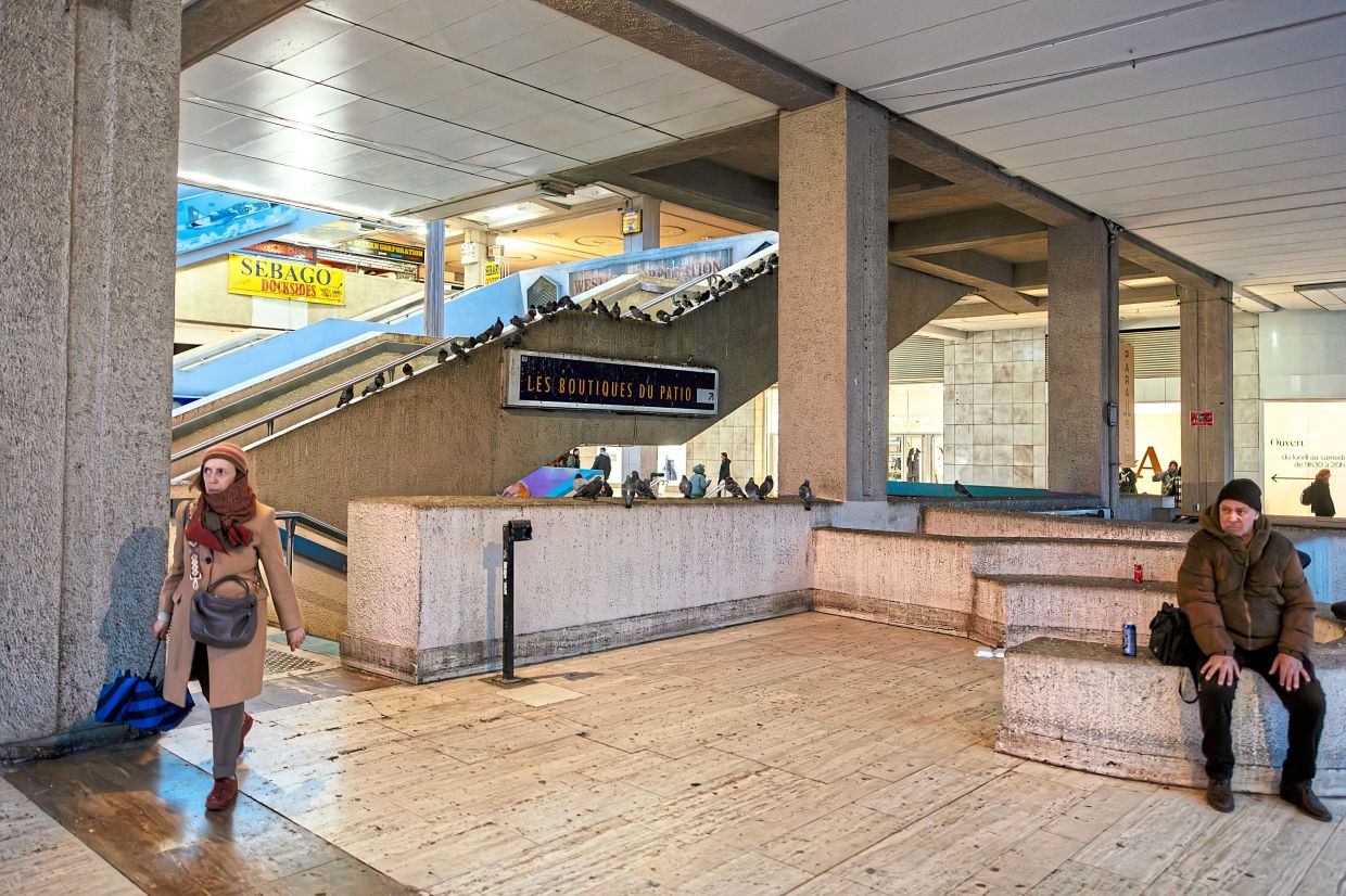 The shopping centre in Tour Montparnasse. Some fear the planned redevelopment will roust a colony of pigeons that nest in the shopping centre’s ceiling. 