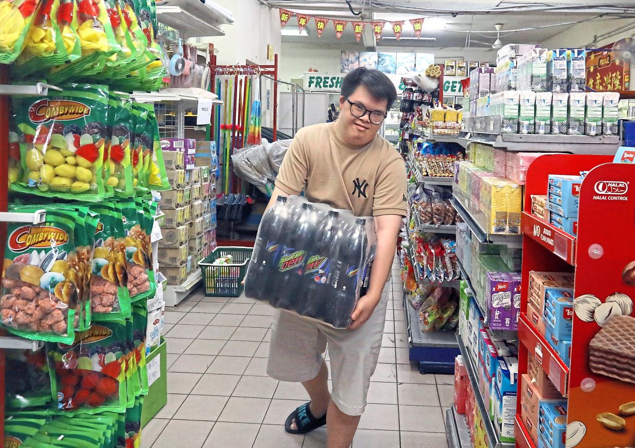 Lim has become a familiar and friendly face to customers in the neighbourhood grocery store.