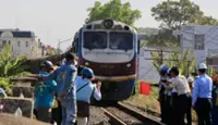 Trains roll again over Vietnam's Ghenh Bridge after barge crash disruption