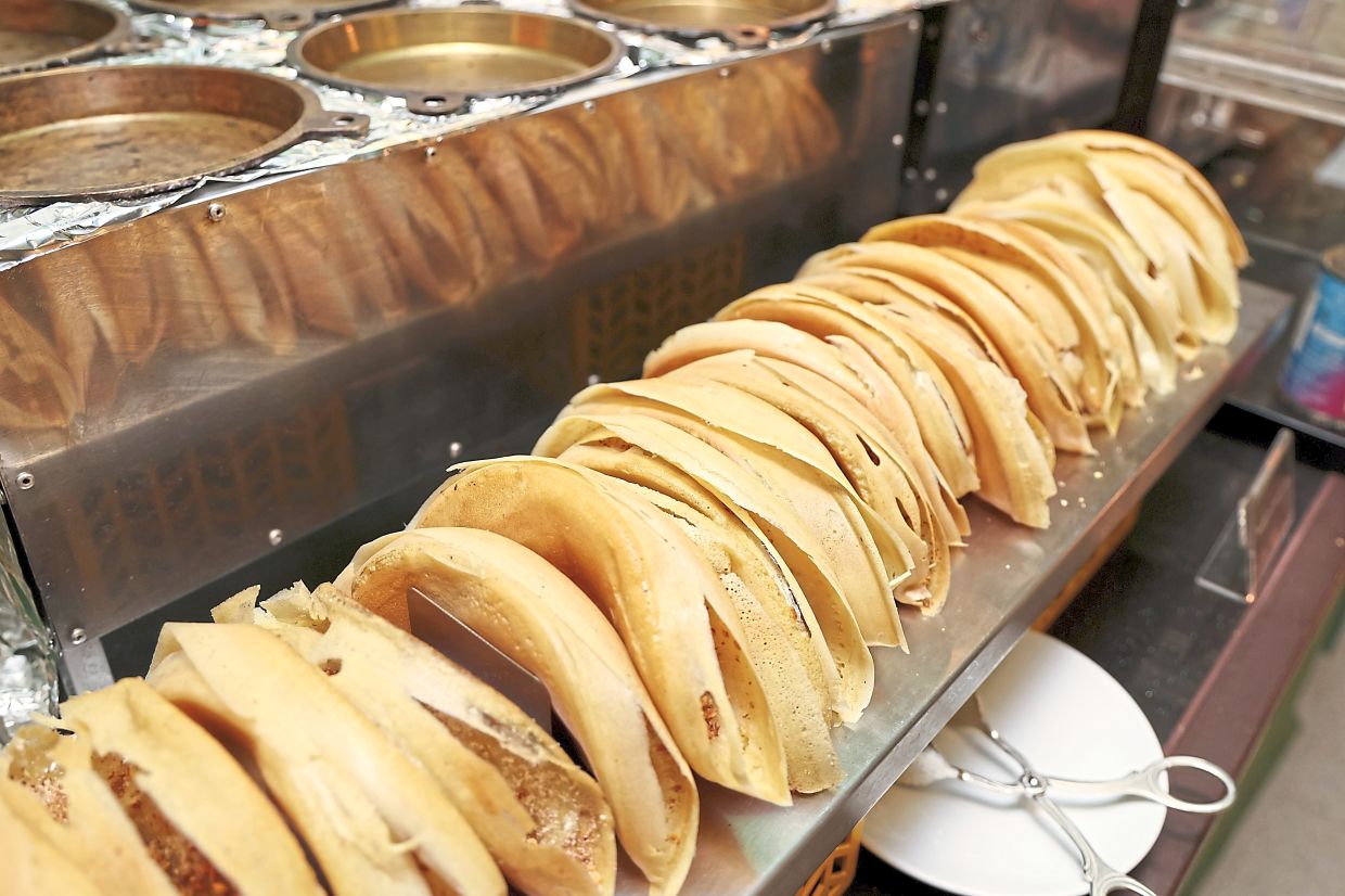 Buffet treats include ‘apam balik’.