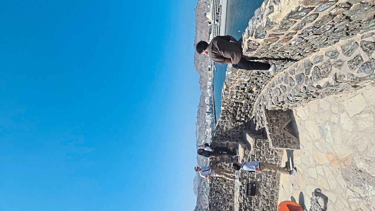 Malaysians playing tourists during a particularly stressful week in Muscat, visiting attractions like the Mutrah Fort.