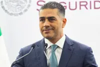 Mexico's heartthrob security minister now available as miniature doll, shirtless or dressed as Batman