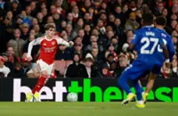 Soccer-Dowman makes history to seal vital Arsenal win over Everton