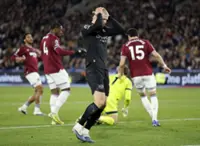 Soccer-Man City lose ground on Arsenal with draw at West Ham