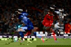 Soccer-Dowman makes history as Arsenal stretch Premier League lead with 2-0 win