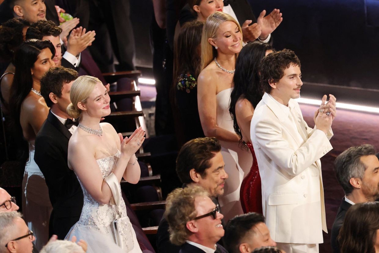 (From left) Priyanka Chopra, Nick Jonas, Elle Fanning, Rose Byrne, Benicio del Toro, Gwyneth Paltrow and Timothee Chalamet attend the 98th Oscars. Photo: AFP
