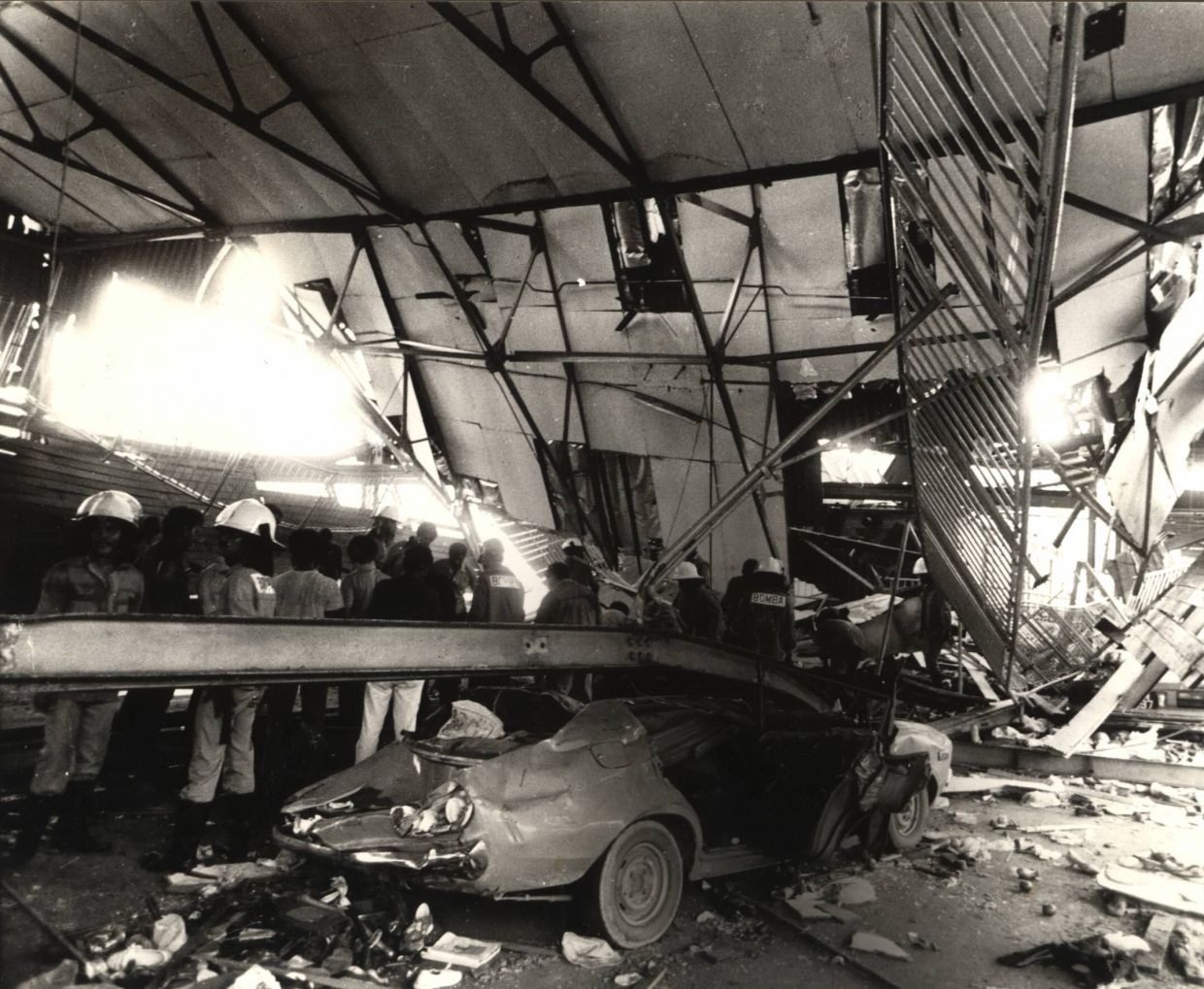 A crushed vehicle at the site. — The Star