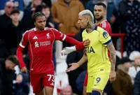 Soccer-Richarlison earns struggling Tottenham a point at Liverpool