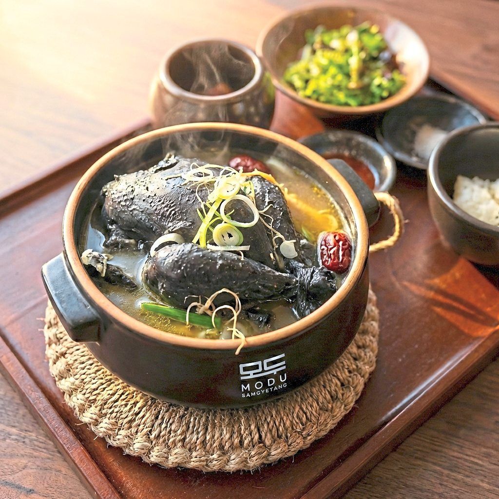 The black chicken version of samgyetang is a more rustic, earthy variant of the dish. — Modu