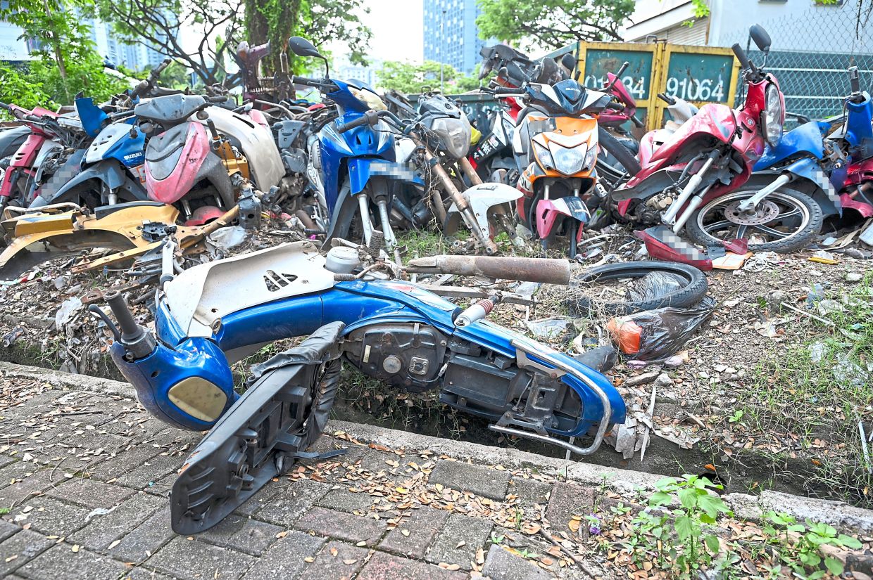 The growing pile of old motorcycles is worrying residents at PPR Kg Muhibbah.