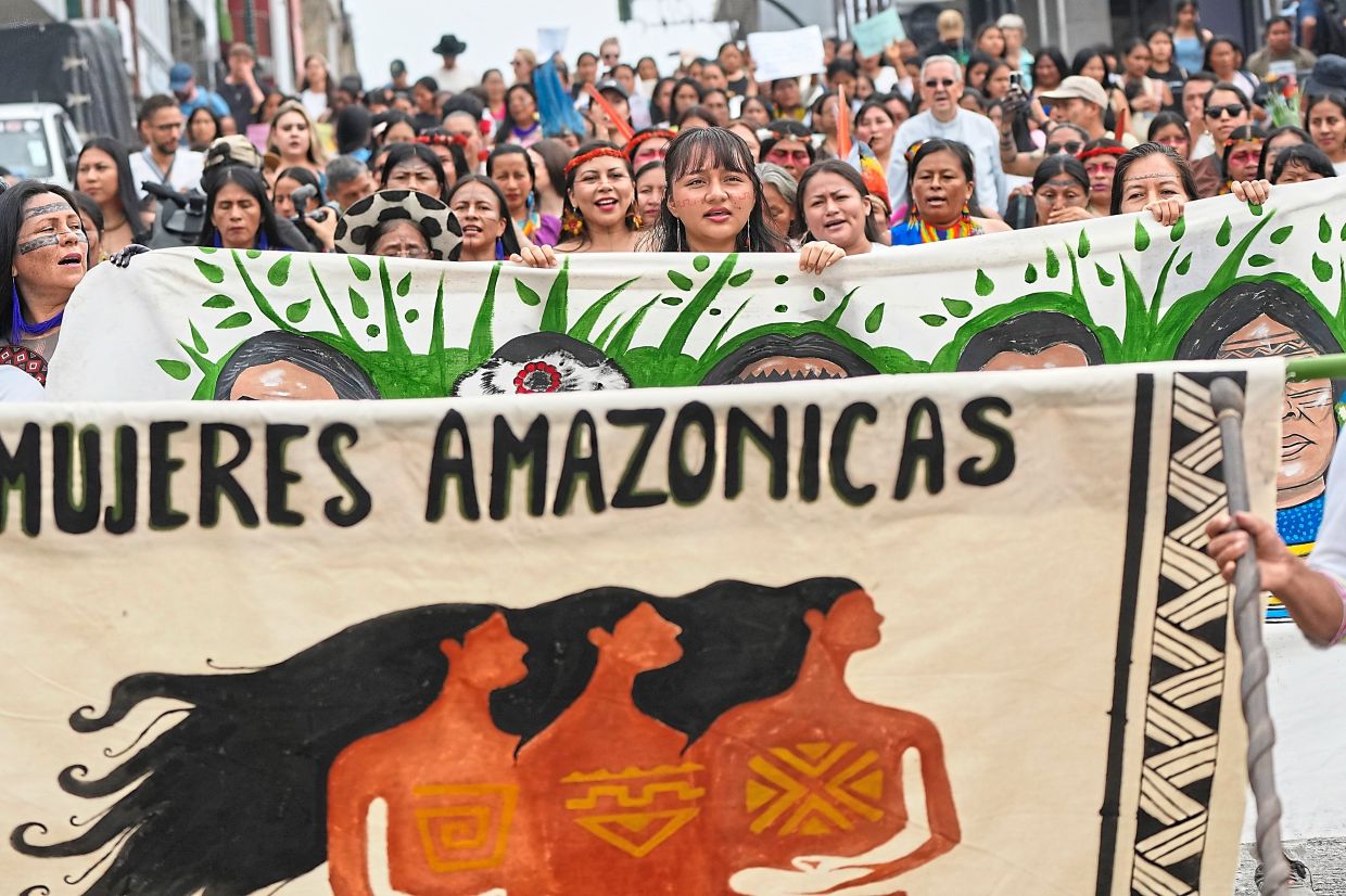 Indigenous women taking part in a march marking International Women's Day in Puyo, on March 8. 