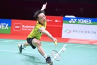 Tanaka blooms late but bright for Japan