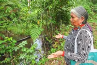 Indigenous women tour Ecuador oil field as warning against Amazon drilling expansion