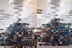 Who loves turbulence, air plane food and the middle seat? They do.