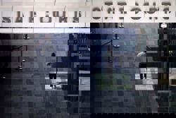 Man charged with harbouring 10 women for prostitution, absconding from Singapore