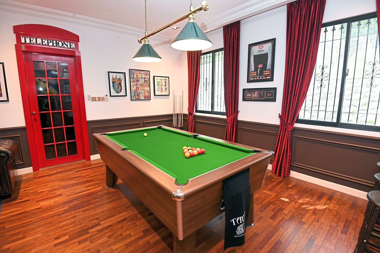 Often seen as a British cultural icon, the red phone booth is the inner side of the hidden door to the man cave.