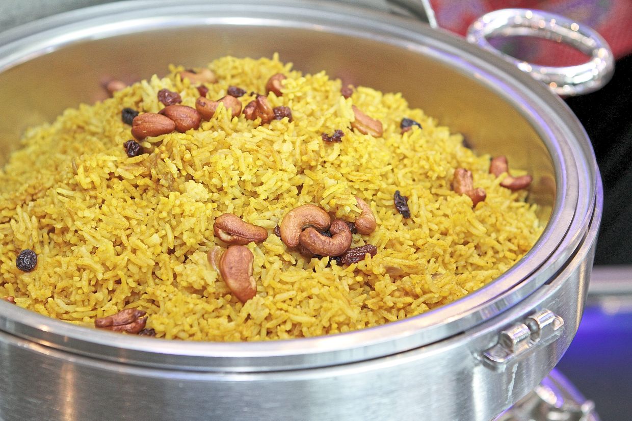 Nasi minyak was once served mostly to royalty because clarified butter and spices were expensive. — Filepic