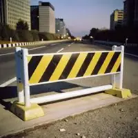 Singaporean man charged in Phuket after crashing into barricades that hit a police officer