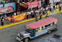 Thousands of Philippine jeepney drivers protest as rising fuel prices drive up costs