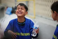Far from home, migrant children kick off own World Cup in Mexico