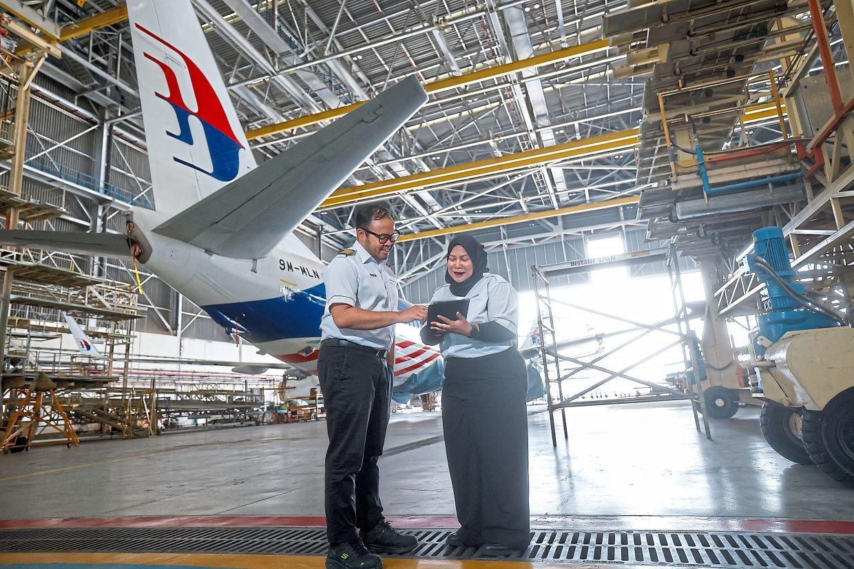 Nurlin and flight attendant Airin (second from right) have made countless sacrifices to pursue their dreams in the aviation sector, proving that passion and determination know no gender. — Bernama 