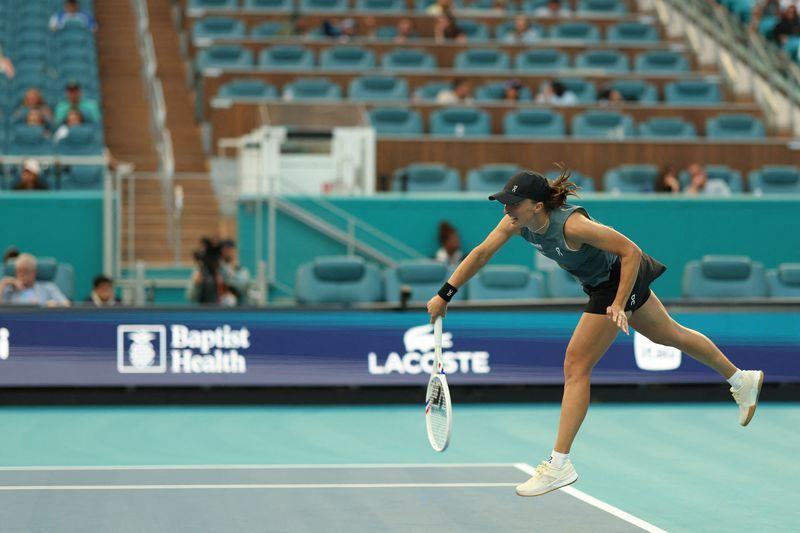 Tennis-Swiatek wants to simplify her game after shock opening defeat in Miami