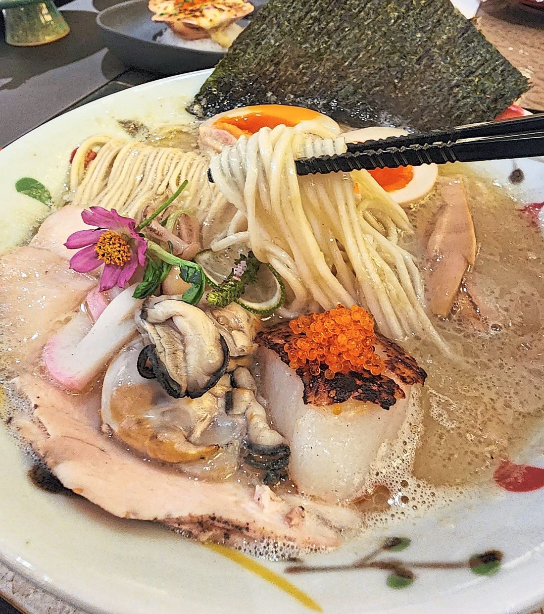 The oyster ramen is an indulgent offering, boosted by the earthy, briny qualities of the oyster puree and fresh oysters in the dish. — ABIRAMI DURAI/The Star