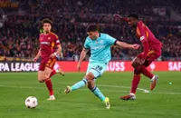 Soccer-Cambiaghi late show sinks Roma as Bologna join Villa and Porto in Europa League quarters