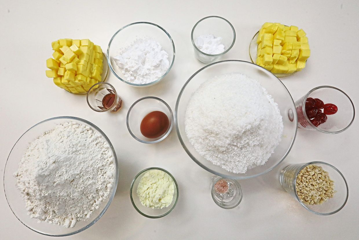 Ingredients include coconut filling, chopped glace cherries and nuts.