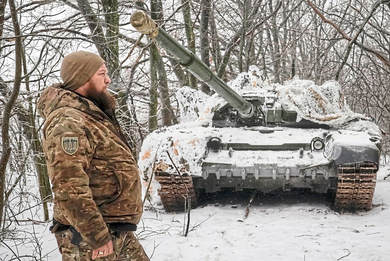 Bohdanov in front of his tank near a front line in Kharkiv region, Ukraine. — Reuters