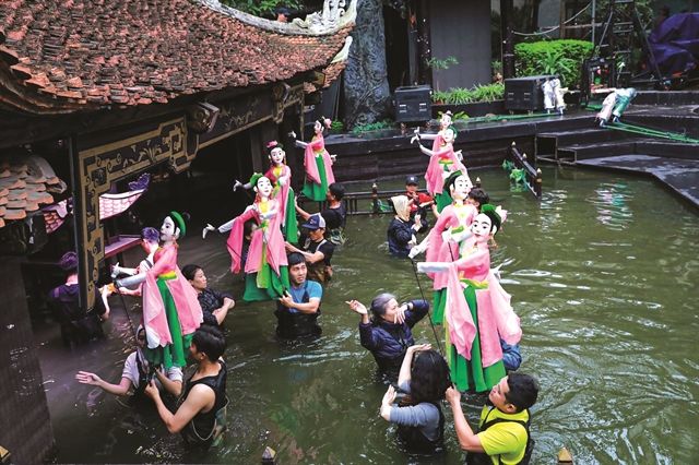 The Vietnam Puppetry Theatre has introduced multiple innovative changes by combining rod puppetry with water puppetry. - VNA/VNS