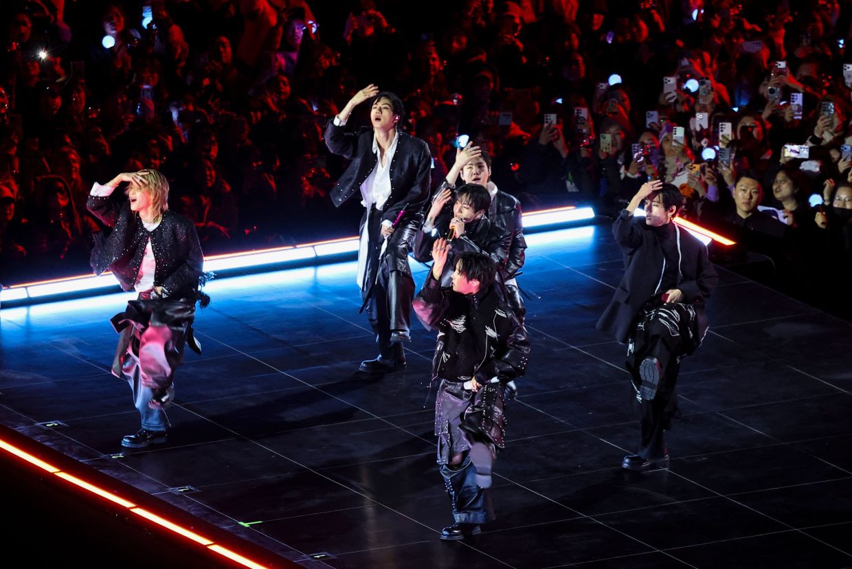 K-pop boy group BTS perform during their concert at Gwanghwamun Square in Seoul on March 21, 2026. — Photo: Kim Hong-Ji / POOL / AFP)