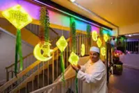 A ‘Garden Raya’ blooms outside Beach Road flat in Singapore