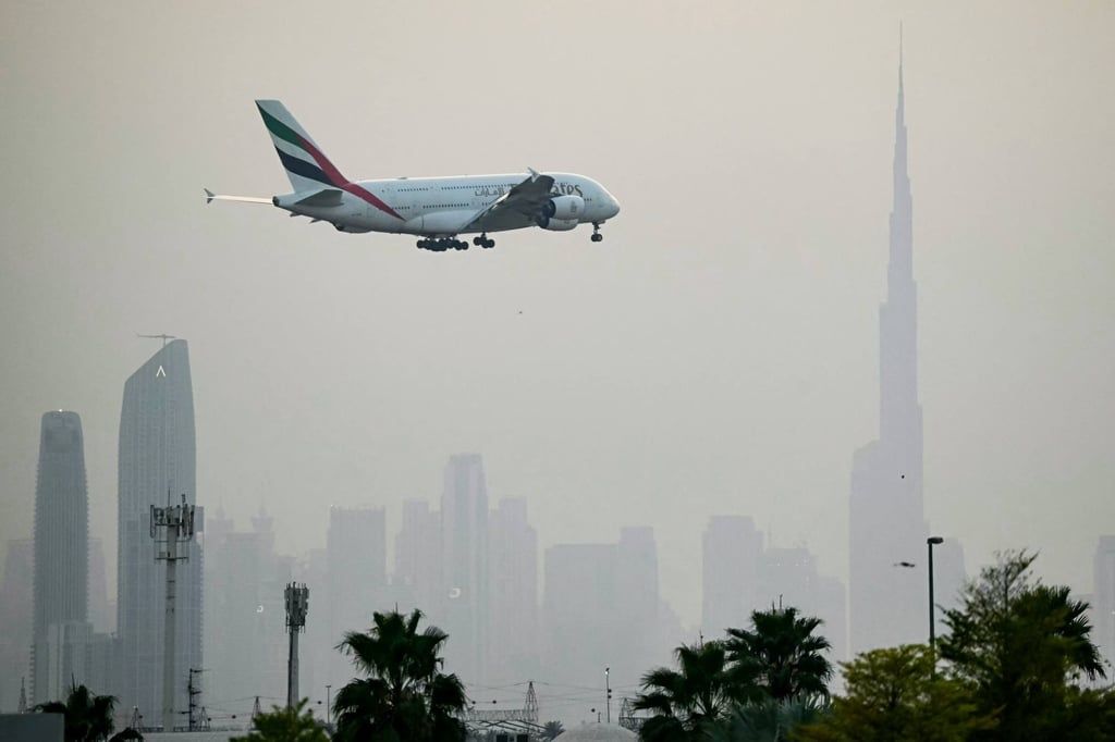 An Emirates aircraft prepares to land at Dubai International Airport. - Photo: AFP